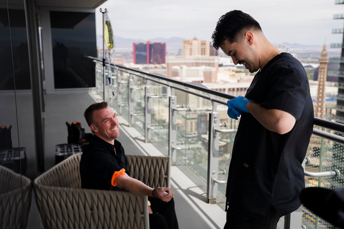 Reset IV nurse treating a client on a Las Vegas Strip balcony